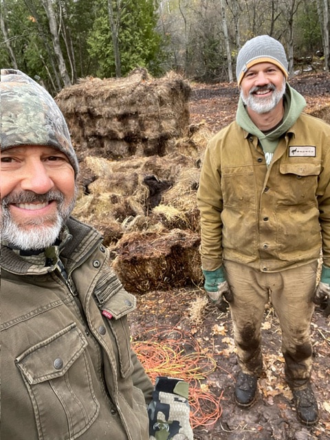 Dave Rivers and his brother working the farm.